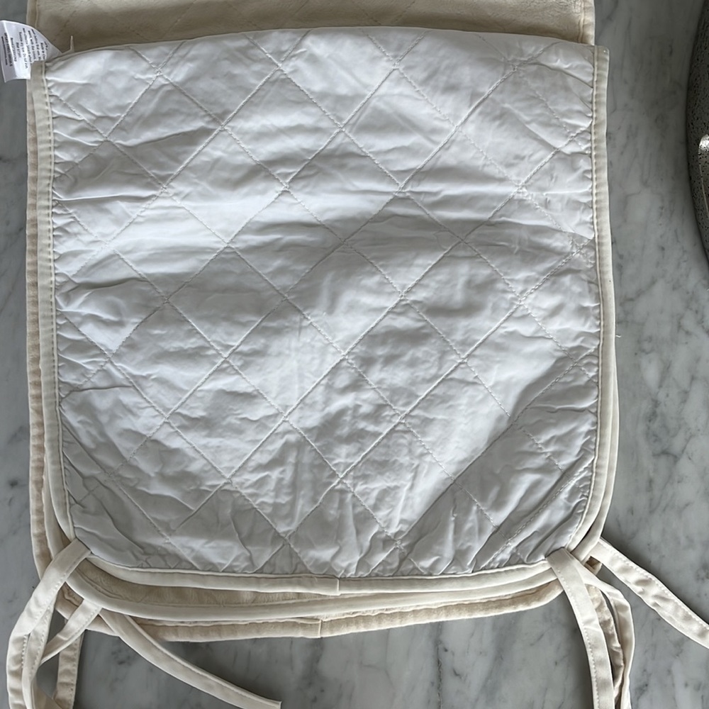 TWO!!!  Bassinet mattress covers or changing table covers